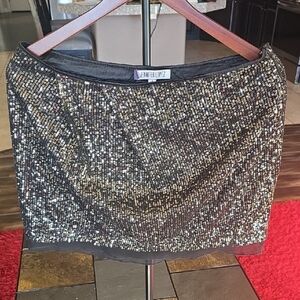 Jennifer Lopez Glittering Black and Gold Mini Skirt